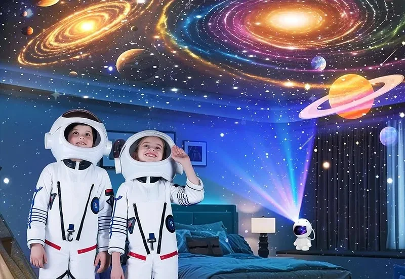 Projecteur astronaute ciel étoilé